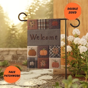May include: A rectangular garden flag featuring a faux patchwork design with various autumn-themed squares, including pumpkins, flowers, and plaid patterns. The center panel is grey with the word Welcome in brown text. It is double-sided.