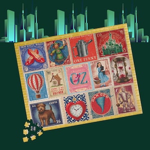 May include: A colorful jigsaw puzzle featuring postage stamp designs with images from The Wizard of Oz. The puzzle includes images of Dorothy, the Tin Man, the Scarecrow, and the Wicked Witch, with a green city skyline in the background.