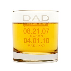 May include: A clear glass tumbler with the text "DAD ESTABLISHED 08.21.07 MASON 04.01.10 MADI KAY" etched on the side.