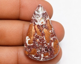 Cabochão de dolomita de cobre natural com belos tons terrosos de marrom e padrões naturais na cor cobre. 32x21x6mm
