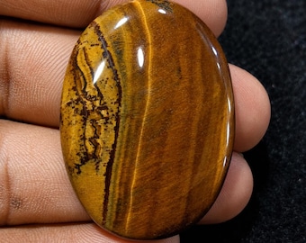 Cabochão de olho de tigre dourado natural, gema oval polida, marrom dourado. 41x30x6mm