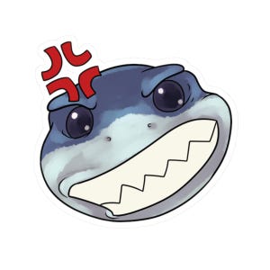 May include: A sticker featuring an illustrated, cartoon-style shark with a wide, toothy grin and angry red symbols above its head. The shark is primarily blue and white, with large black eyes.