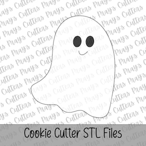 May include: A white ghost-shaped cookie cutter outline featuring two solid black oval eyes and a simple curved black line for a mouth. The background displays a repeating watermark of the text Pray's Cutters, with the text Cookie Cutter STL Files below.