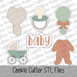 May include: A collection of baby-themed cookie cutter designs. The set includes a onesie, pacifier, rattle, baby carriage, and the word "baby". The cutters are in a neutral color palette of beige, green, and brown.