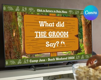 May include: A television screen displays a presentation titled "Camp Bachelorette - What Did the Groom Say?" with a wooden sign graphic. The sign reads "What did THE GROOM Say?" with champagne glasses. The presentation is for a bachelorette weekend.