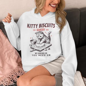 Funny Kitty Biscuits Bakery Shirt, We Knead Em You Knead Em Shirt, Cat Owner Tee, Cute Cat Baking Shirt, Humorous Bakery Cat