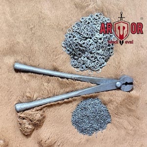 May include: A collection of metal chainmail rings and chain, along with a pair of metal pliers. The image also includes the text "Armor Medieval" in a shield logo.