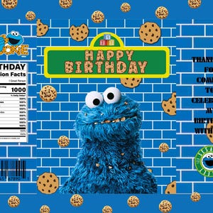 May include: A blue and yellow birthday-themed graphic featuring Cookie Monster. The design includes a brick wall background, cookies, and the words "Happy Birthday." There is also a nutrition facts label and the Sesame Street logo.