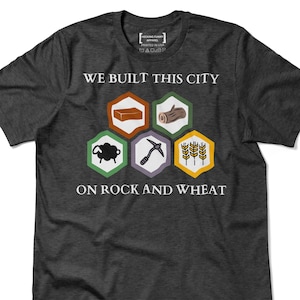We Built This City on Rock and Wheat Shirt, Settlers of Catan T-Shirt, Funny Board Game Tee, Gift for Tabletop Game Lover, Casual Gamer Wear