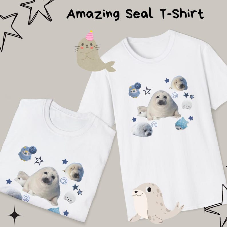 May include: White t-shirts with a seal graphic. The shirts feature a cute seal illustration with blue accents, stars, and the text "Amazing Seal T-Shirt". The design includes a seal wearing a party hat.