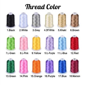 May include: A color chart of thread spools, labeled with numbers and color names. Colors include black, white, grey, off-white, khaki, brown, green, pink, yellow, purple, blue, red, orange, and maroon.