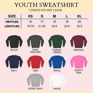 May include: Image of a selection of youth sweatshirts in colours such as black, dark heather, forest green, maroon, navy, red, royal, safety pink, sport grey, and white. The image includes size and measurement information in inches, with the width ranging from 40.6 cm to 50.8 cm.