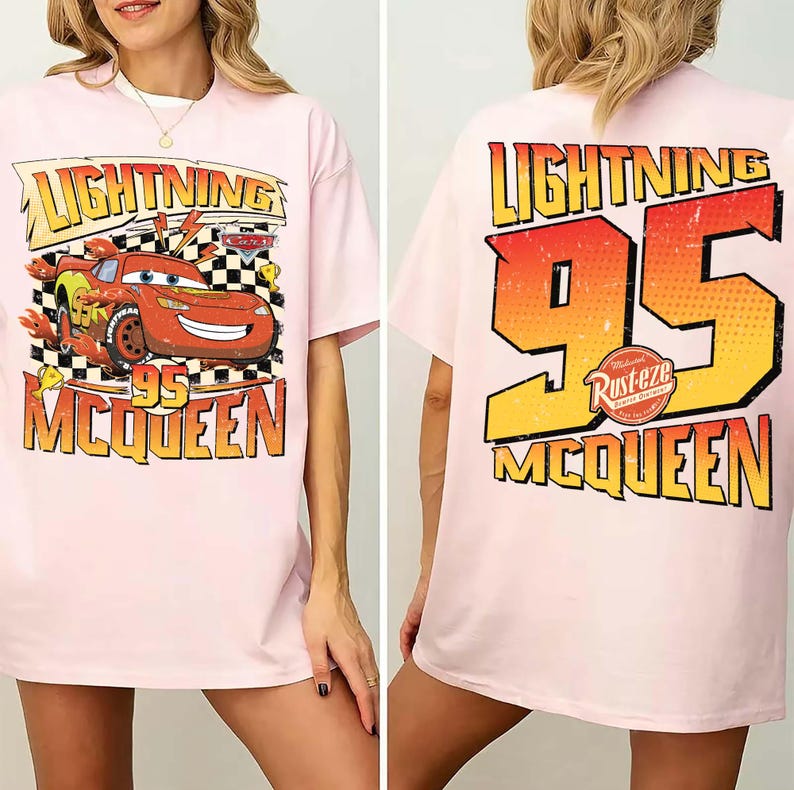 May include: Pale pink t-shirt with a Lightning McQueen design. The front displays McQueen racing with "Lightning 95 McQueen". The back features a large "95" and "Lightning McQueen" text in a retro style.