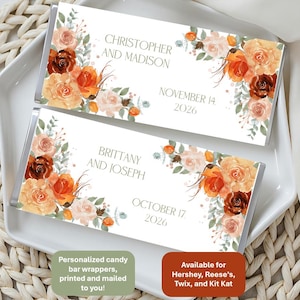 May include: Two personalized candy bar wrappers with floral designs. One wrapper reads "Christopher and Madison, November 14, 2026." The other reads "Brittany and Joseph, October 17, 2026." The wrappers are decorated with orange, peach, and brown roses.