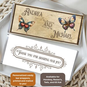 May include: Two rectangular candy bar wrappers with custom designs. The top wrapper features a beige background, two butterflies with heart-shaped bodies, and the text Andrea and Michael. The bottom wrapper is white with ornate borders and the text Thank you for sharing our joy!