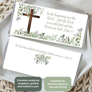 May include: Two Christian candy bar wrappers with a cross and botanical design. The top wrapper has the text "In the beginning was the Word. And the Word was with God and the Word was God. John 1:1." The bottom wrapper has the text "The Word became flesh and made his dwelling among us. John 1:9."