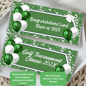 May include: Two candy bar wrappers with green backgrounds and white text. One says "Congratulations Liam! Class of 202X" and the other says "Golf Tournament Classic 202X." Both have green and white balloons and a graduation cap graphic.