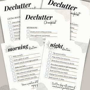 May include: A stack of white paper checklists with black text. The checklists include "Declutter" and "Morning Routine" with checkboxes. The checklists are decorated with a sunburst and abstract line designs.