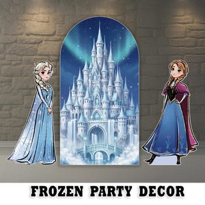 May include: Party decorations featuring Elsa and Anna from Frozen, with a backdrop of a castle under a starry sky. The decorations include cutouts of the characters and a large castle scene, with the text "FROZEN PARTY DECOR" at the bottom.
