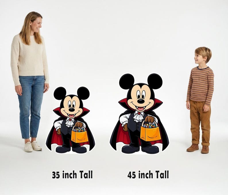 May include: Two Mickey Mouse vampire cutouts dressed in black capes with red linings, white ruffled shirts, and black vests, each holding an orange candy bucket. The left cutout is labeled 35 inch Tall and the right is 45 inch Tall.