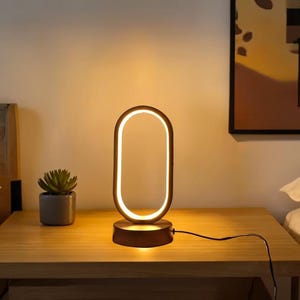 Minimalist Oval LED Table Lamp – Modern Scandinavian Bedside Light, Dimmable Warm Glow, Nordic Home & Office Decor