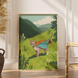 Könnte beinhalten: Gerahmter Kunstdruck mit einer Sphynx-Katze mit Umhang, eingebettet in eine grüne Wiese mit Bergen im Hintergrund. Die Katze ist hellbraun mit einem roten und türkisfarbenen Umhang. Das Kunstwerk hat einen Vintage-Illustrationsstil.