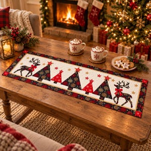 May include: A rectangular quilted table runner featuring a repeating pattern of reindeer with red bows and Christmas trees in shades of red, black, and white. The design includes gold star accents and a dark border with a snowflake motif.