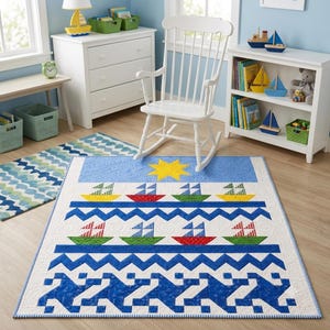 May include: A rectangular quilt featuring a nautical theme with rows of colorful sailboats, blue chevron patterns, and a yellow star on a light blue background. The quilt has a white border and intricate stitching throughout the fabric surface.