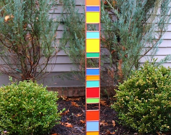 Best Selling Tall Glass Garden Sentry. Stained glass 44" stake. Opaque multicolored. Beautiful eye catching statement yard decoration.