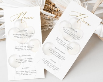 May include: Two white cards with the word "Menu" written in gold script. Each card has a list of meal courses: Appetizer, Starter, Main Course, and Dessert. Each course is surrounded by a white balloon with a gold outline.