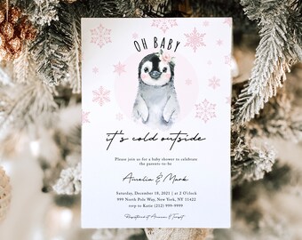 May include: A baby shower invitation featuring a penguin illustration and the text "Oh Baby it's cold outside". The invitation is decorated with pink snowflakes and includes the names Amelia & Mark, the date and time of the shower, and the address. It also provides RSVP details and registry information.