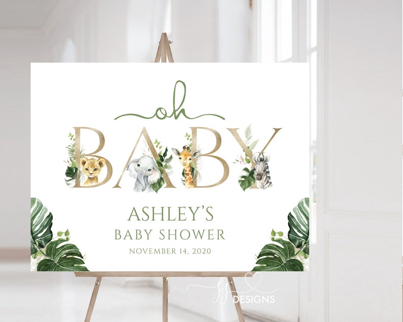 K&ouml;nnte beinhalten: Ein wei&szlig;es Schild mit goldenen Buchstaben, auf dem "oh baby" steht, mit einem gr&uuml;nen Blattdesign und Tierillustrationen. Das Schild enth&auml;lt auch den Text "Ashley's Baby Shower" und "November 14, 2020".