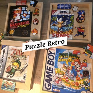 Könnte beinhalten: Vier Holzrahmen mit Puzzles, die Retro-Videospiel-Cover für Super Mario Bros, Sonic the Hedgehog, The Legend of Zelda The Minish Cap und Super Mario Land 2 6 Golden Coins zeigen, mit dem eingeblendeten Text Puzzle Retro.