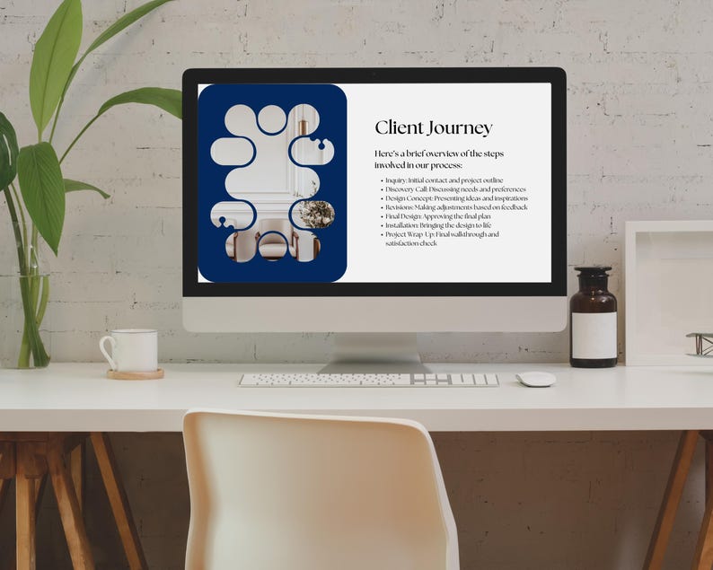 May include: A computer monitor displays a presentation titled "Client Journey." The screen shows a blue and white graphic with text outlining the steps involved in a project. A white desk holds the monitor, a cup, and a decorative plant.