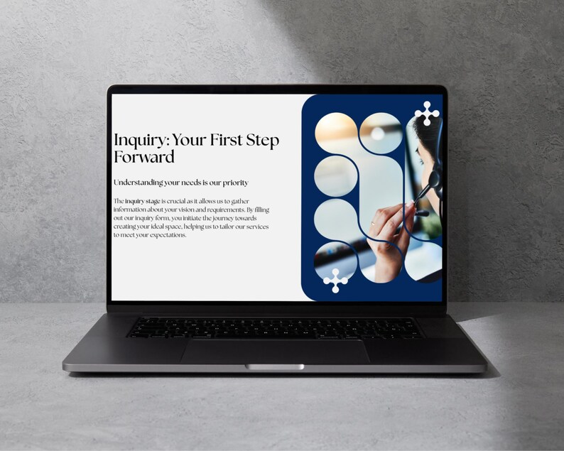 May include: A laptop displaying a webpage with the text "Inquiry: Your First Step Forward." The screen has a white background with text and a blue design on the right side. The laptop is on a gray surface.