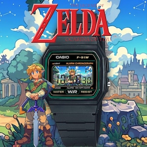 May include: A black Casio F-91W digital watch featuring a custom display with The Legend of Zelda Ocarina of Time branding. The watch face shows the time 10:50:30, the date 14, and a small graphic of the character Link holding a sword.