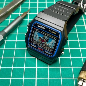 Casio F91 - “Saint Seiya” - 3D Paper Crafted Watch Mod image 1