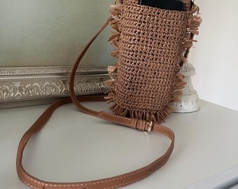 Crocheted summer holder for a water bottle and a mobile phone