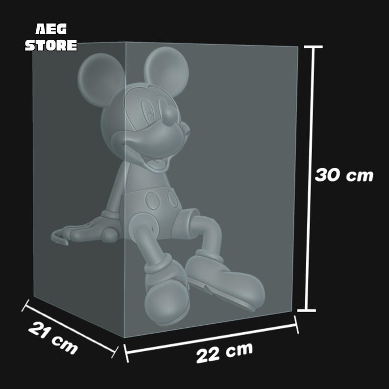 May include: A gray Mickey Mouse figurine, seated, inside a clear display case. The case measures 22 cm wide, 21 cm deep, and 30 cm high (approximately 8.7 x 8.3 x 11.8 inches). The "AEG STORE" logo is visible in the upper left corner.