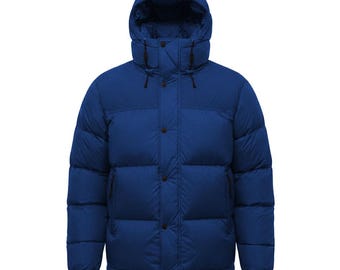 May include: A blue puffer jacket with a hood. The jacket has a button-up front and two side pockets. The hood is adjustable with drawstrings. The jacket is designed for cold weather and is made of a durable, water-resistant material.