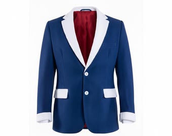 May include: A navy blue blazer with white lapels, pocket trim, and cuffs. The interior lining is a deep red. The blazer has two white buttons and a single chest pocket. A classic, tailored jacket.