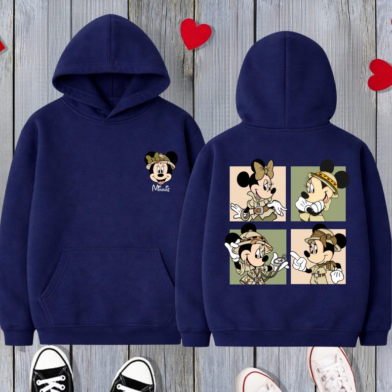 May include: A white ceramic mug with a black handle and the text "But First, Coffee" in a bold, black font. The mug is set against a blurred background, highlighting its simple design.