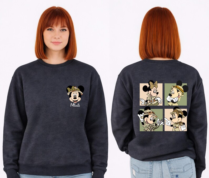 May include: Dark blue sweatshirt with Minnie Mouse in safari clothing. The front has a small Minnie Mouse graphic and the name "Minnie". The back shows a four-panel design of Minnie and Mickey Mouse in safari outfits.