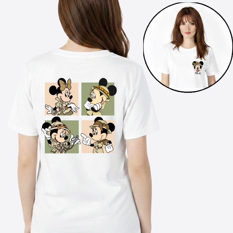 May include: White t-shirt with a small Minnie Mouse graphic on the front and a four-panel design on the back. The back design shows Minnie and Mickey Mouse in safari outfits. The shirt is made of a soft, comfortable material.