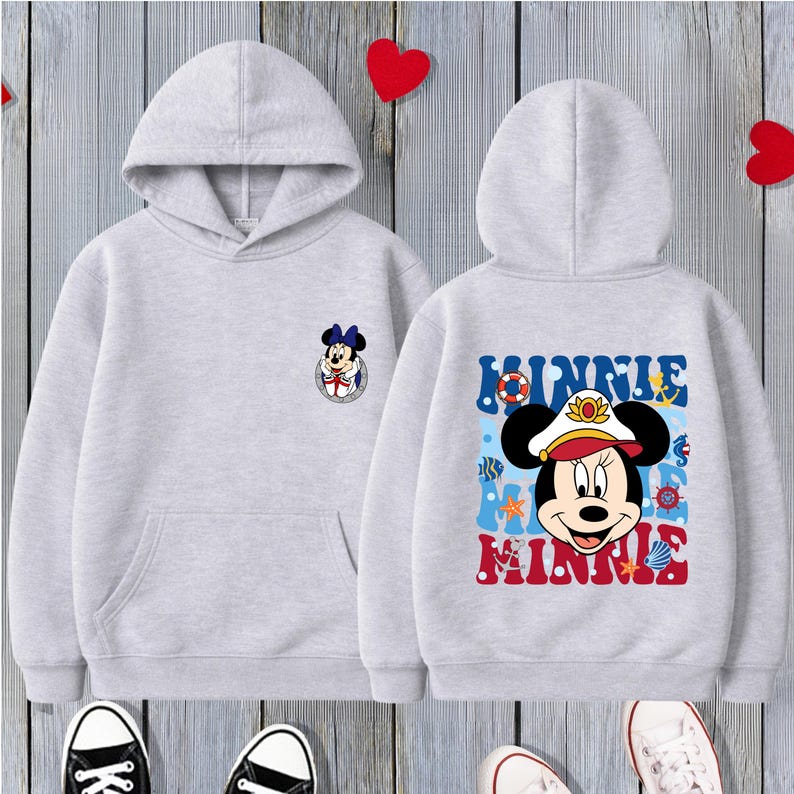 May include: Two light gray hoodies with a Minnie Mouse design. One has a small Minnie Mouse graphic on the front. The other has a larger Minnie Mouse graphic on the back with the words "Minnie" in blue and red.
