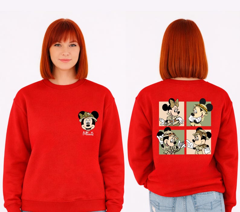 May include: A bright red sweatshirt with Minnie Mouse safari designs. The front has a small Minnie Mouse graphic with the name "Minnie". The back features a four-panel design of Minnie in various safari poses.
