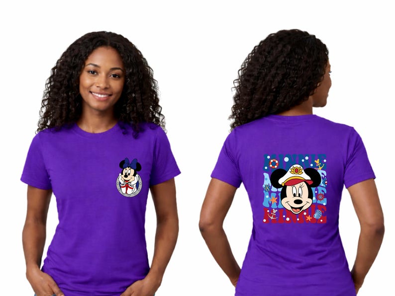 May include: Purple t-shirt featuring Minnie Mouse. The front has a small graphic of Minnie Mouse in a blue bow. The back has a larger graphic of Minnie Mouse in a sailor hat with nautical elements. The shirt is short-sleeved.
