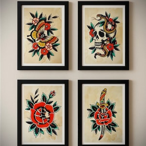 May include: Four framed art prints with traditional tattoo designs. The prints feature a butterfly, skull with snake, rose, and a dagger through a rose. Each design is surrounded by red and green floral elements.