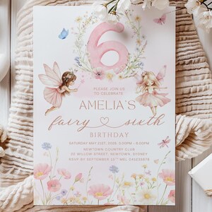 May include: A fairy-themed birthday invitation with the number 6 in pink, surrounded by flowers. The invitation features two fairies, the text "Amelia's fairy sixth birthday", and event details. Soft colors and floral elements create a whimsical design.