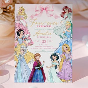May include: A rectangular birthday invitation card featuring a pink bow at the top and illustrations of eight princesses. The text reads Four-ever a princess, Amelia is turning 4, Sat 23 Sep at 3 o'clock, Newtown Country Club, 22 Willow Street, Sydney.